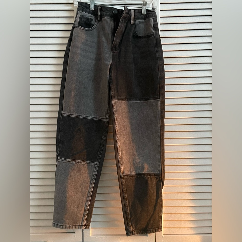 The grey and black denim mom jeans are from Angel kiss.